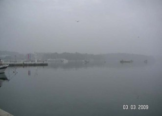 Poreč u magli
