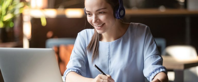 Smiling,Girl,Student,Wear,Wireless,Headphone,Study,Online,With,Skype