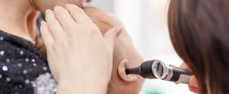 Doctor,Examining,Childs,Ear,With,Otoscope.,Mom,Holding,Baby,With Doctor,Examining,Childs,Ear,With,Otoscope.,Mom,Holding,Baby,With